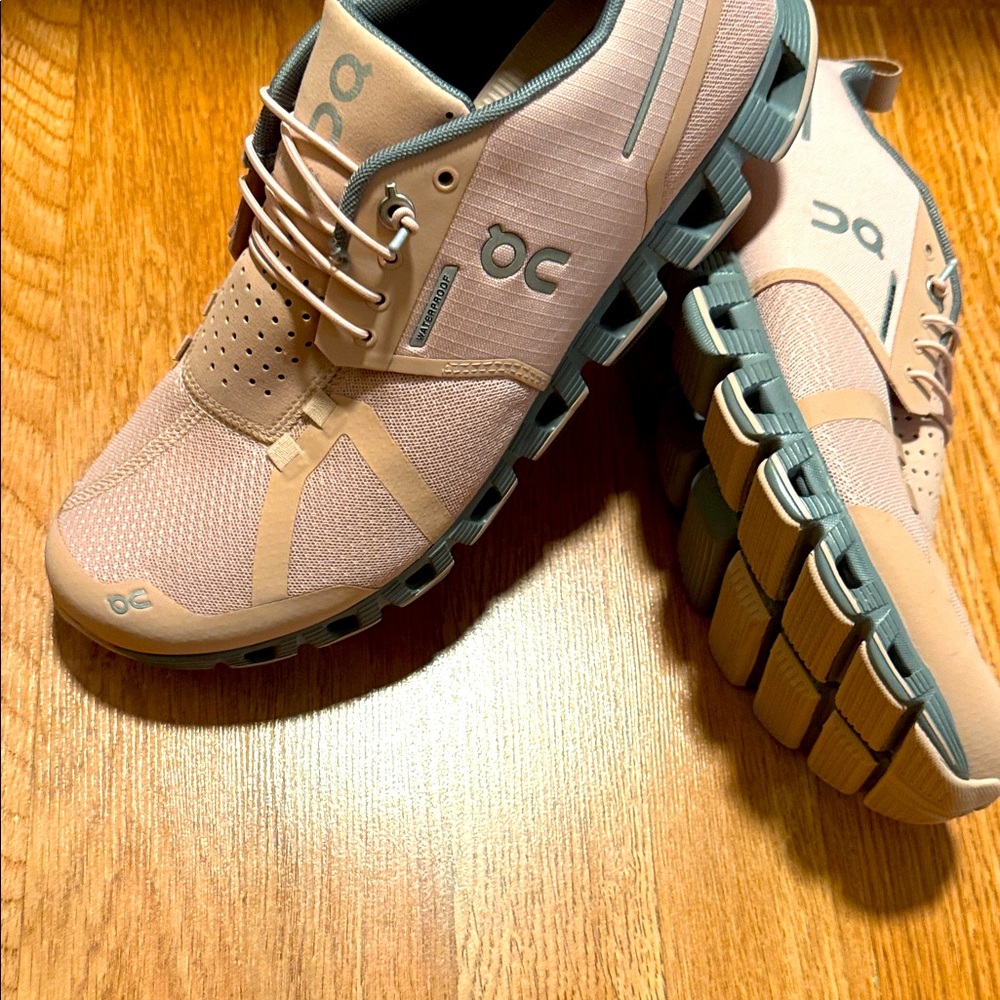 On Running Peach and Gray Athletic Shoes